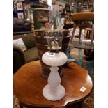 Victorian oil lamp with milk base. (50 cm h).