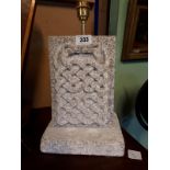 Carved granite table lamp. (48 cm h).