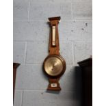 Late 19th. C. oak barometer. (65 cm H).