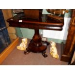 William IV rosewood TOL card table with octagonal legs on round platform with scrolled feet.