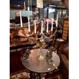 Ecclesiastical brass seven branch candelabra. (62 cms h x 72 cms w).