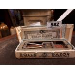 Rolls Razor in original box.
