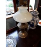 Victorian brass Aladdin table lamp with milk glass mushroom shade.