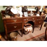 Georgian mahogany sideboard with three long drawers in frieze over two short drawers with tapered