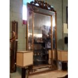 Decorative gilt over mantle in the French style.(184 cm h x 91 cm w)