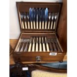 Edwardian cutlery set in original oak case.