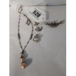 White metal brooch and anchor pendant, pair of pearl earrings and a white metal necklace with