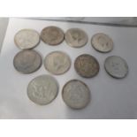 Ten 1960's Kennedy 10 dollar pieces.