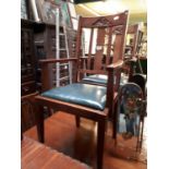 Edwardian set of six oak chairs with two carver chairs .