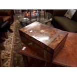 (15 cm h x 30 cm w x 13 cm d) Victorian burr walnut writing box with brass mounts.