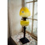 19th. C. brass and metal corinthian column oil lamp with coloured glass bowl and etched tulip