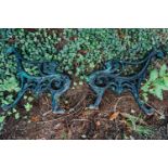 Two pairs of 19th C. cast iron bench ends decorated with lions masks and hairy paw feet. { 23 cm H X