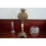 19th. C. gilded metal and onyx oil lamp with etched glass football shade. { 68cm H }.