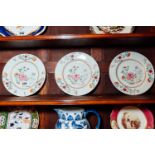 Three late 18th. C. Oriental ceramic plates decorated with flowers. { 23cm Dia. }.