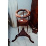 Edwardian mahogany wig stand in the Georgian style. {74 cm H X 36 cm Dia. }.