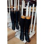 Two pairs of Gentleman's riding boots with wooden trees..