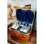 Good quality 19th. C. brass bound burr walnut ladies travelling vanity case, the fitted interior