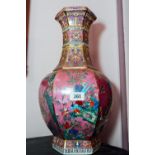 Pair of Oriental ceramic vases. { 52cm H }.