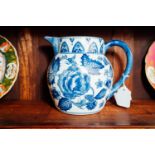 Blue and white ceramic jug Macey's of London. { 19cm H }.