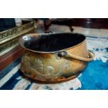 19th. C. embossed brass coal bucket. { 28cm H X 46 cm W X 33cm D }.