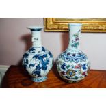 Two ceramic Oriental vases. { 33cm H & 35cm H }.