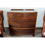 Edwardian bowfronted mahogany chest the two short drawers over three long drawers. { 109cm H X 107cm
