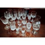 Collection of cut glass drinking glasses.