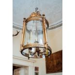 Good quality brass and glass circular hall lantern, in the Regency manner. { 120 cm H X 58cm Dia. }.