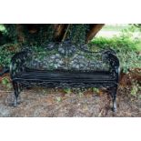 Cast iron garden bench with oak leaf design in the Coalbrookdale style. { 92cmH X 166cm W X 72cm