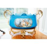 Decorative ceramic jardiniere with gilded metal mounts and the cartouche with Romantic scene. { 43cm