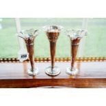 Pair of silver plated vases and another vase. { 19cm H }.