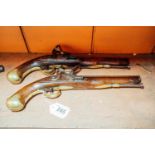 Pair of 19th. C. flintlock pistols.