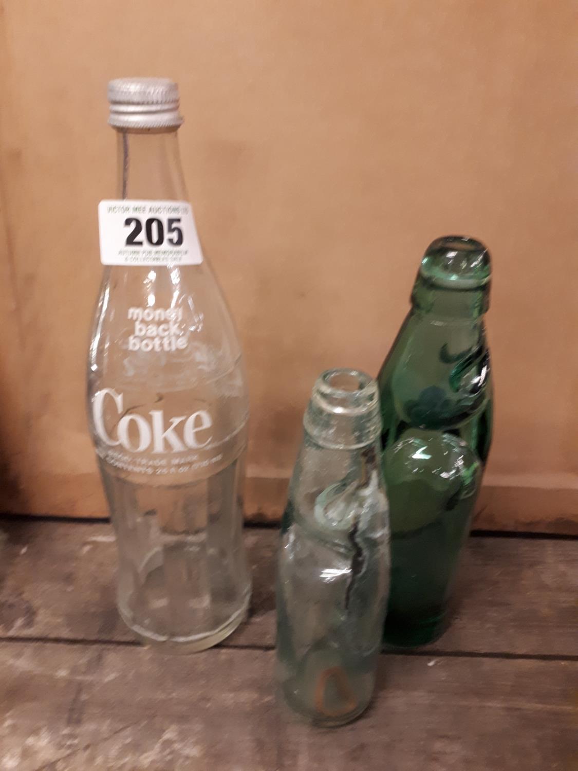 Three vintage bottles.