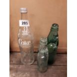 Three vintage bottles.