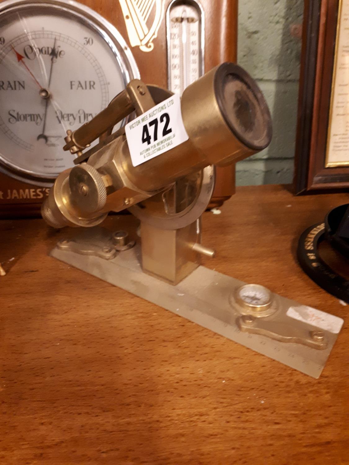 Brass theodolite .