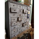 19th C. painted pine bank of thirty two draws {120 cm H x 121 cm W x 32 cm D}.