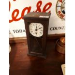 Early 20th. C. pine cased mantle clock.