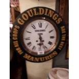 Wooden wall clock with later painted Goulding's Manures advertising {33 cm D}.