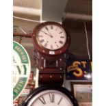 19th C. rosewood wall clock with mother of pearl inlay and painted dial. { 65cm H X 41cm W }.