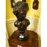 Bronze bust of young girl mounted on a circular base. { 47cm H X 22cm W X 20cm D }.