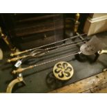 Set of brass and metal fire irons and brass trivet.