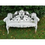 Cast iron arched back garden seat { 146cm W }.