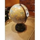 World globe raised on Bakelite base. { 33cm H }.