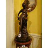 Bronze sculpture of elegant semi nude lady seated. { { 64cm H X 27cm Dia. }.