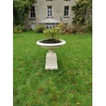 Cast iron urn centre piece on matching plinth . { 90cm H X 84cm W }.