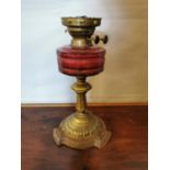 19th C. brass and metal oil lamp.