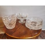 Three cut glass bowls.