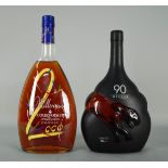 Due Cognac da 1 lt.: - Cognac COURVOISIER - Millenium 2000. Fine Champagne e Borderies.