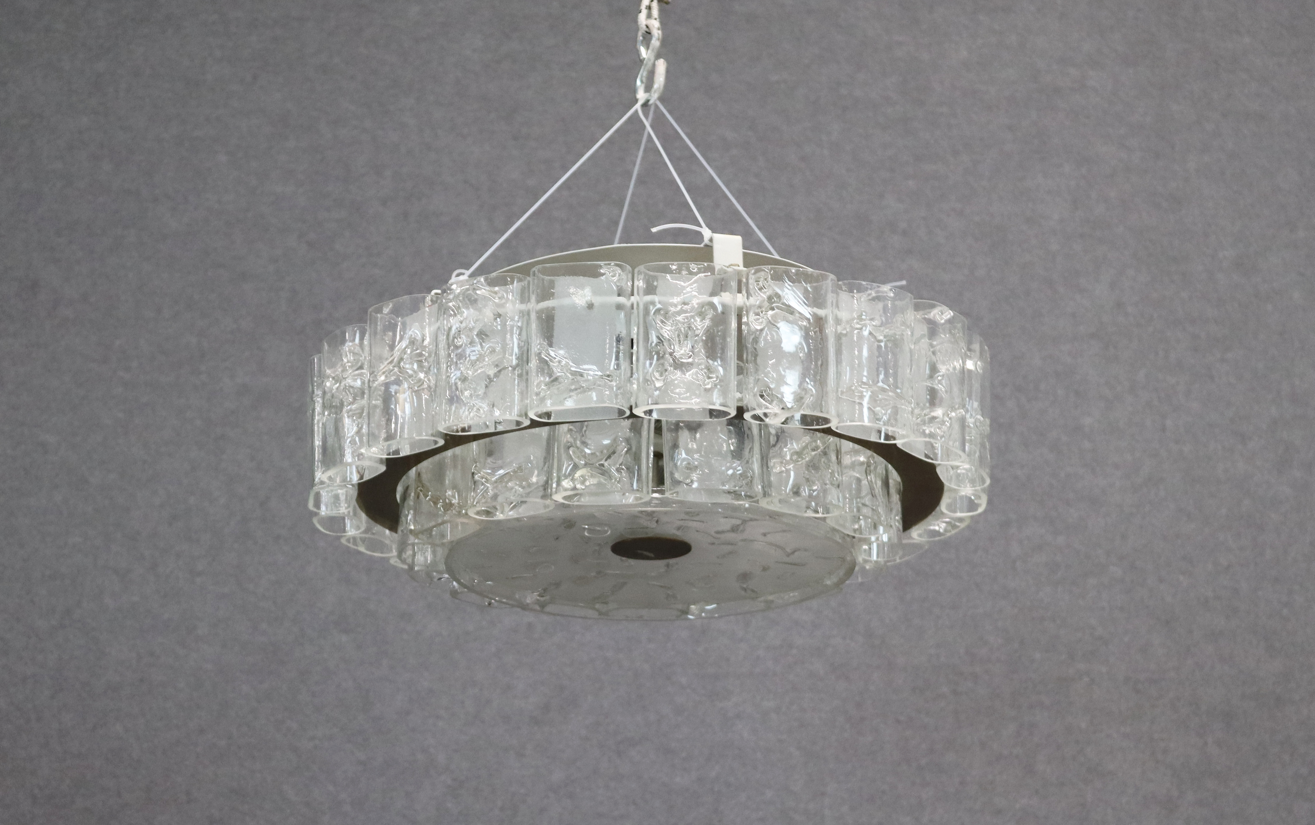 Italian manufacture. Glass and metal chandelier