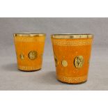 FORNASETTI. Pair of screen-printed metal cachepot